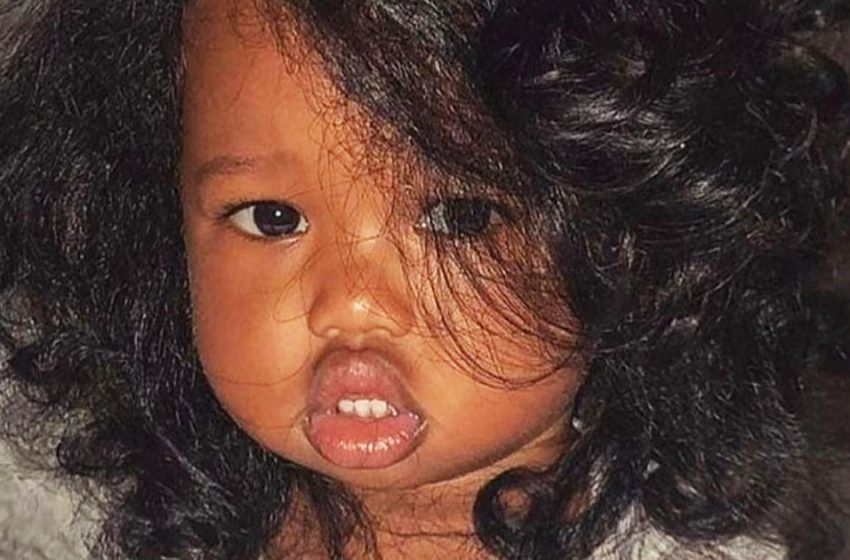  What does a girl with big lips look like, whose mother has Kenyan roots, and father is Asian