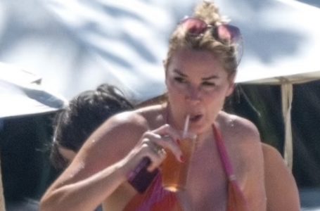 Radiant 53-Year-Old TV Star Stuns in Vibrant Bikini on Barbados Getaway!: Can You Guess Who She Is?